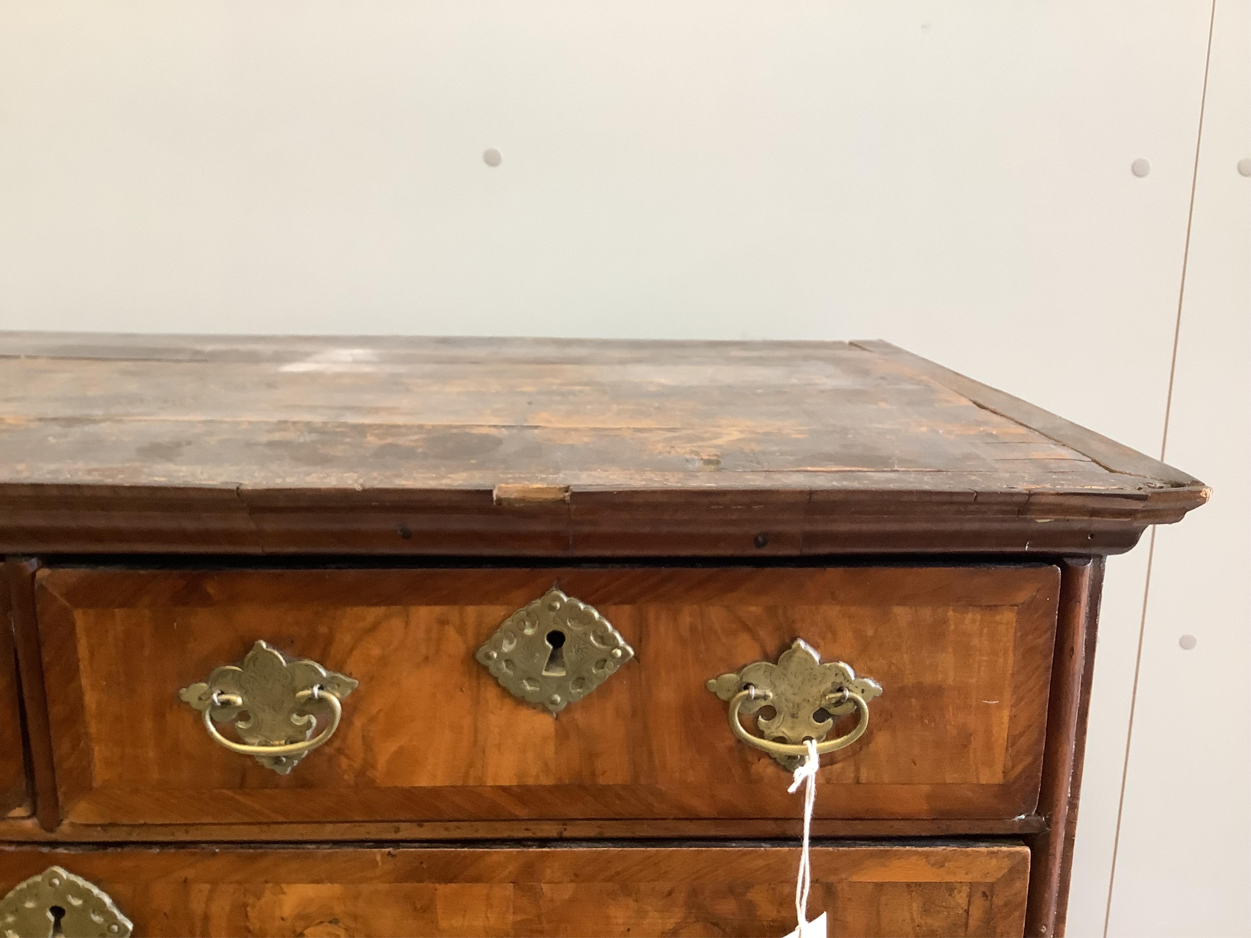 An 18th century and later walnut chest on stand, width 96cm, depth 55cm, height 161cm. Condition - fair